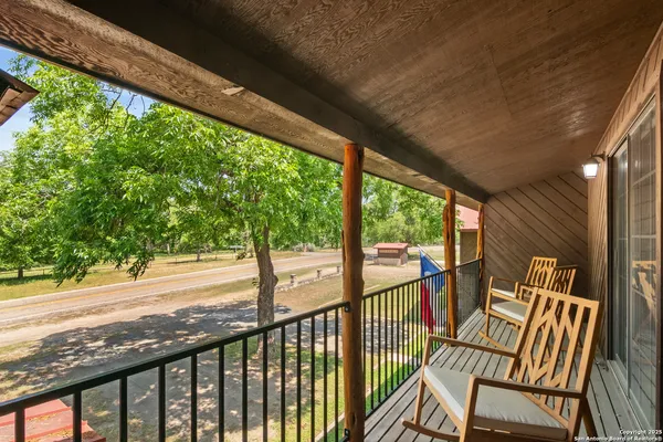 a view of a two chair in the balcony
