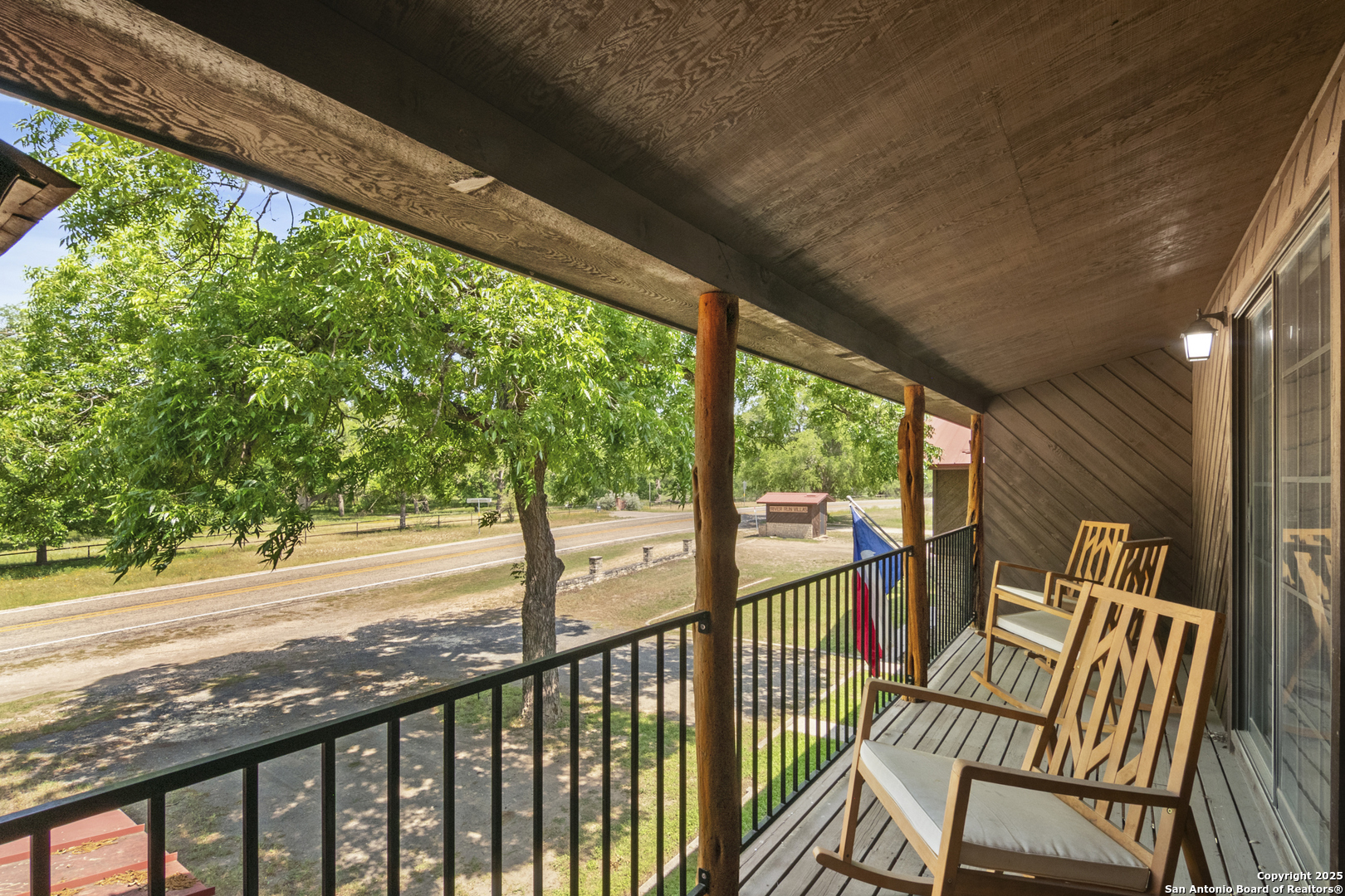 6641 Ranch Road 1120, Unit A B C D Rio Frio, TX 78879 - Photo 8 of 34 a view of a two chair in the balcony