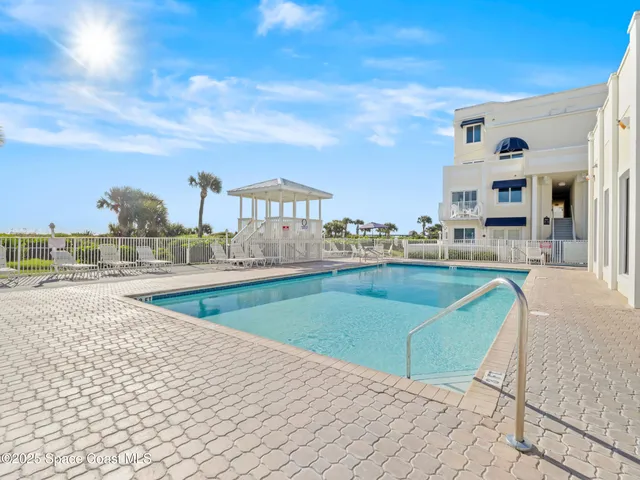 a view of a swimming pool and a terrace