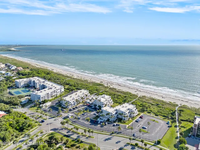 a view of a lake with a beach