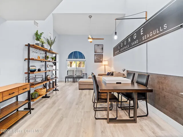 a workspace with furniture window and wooden floor