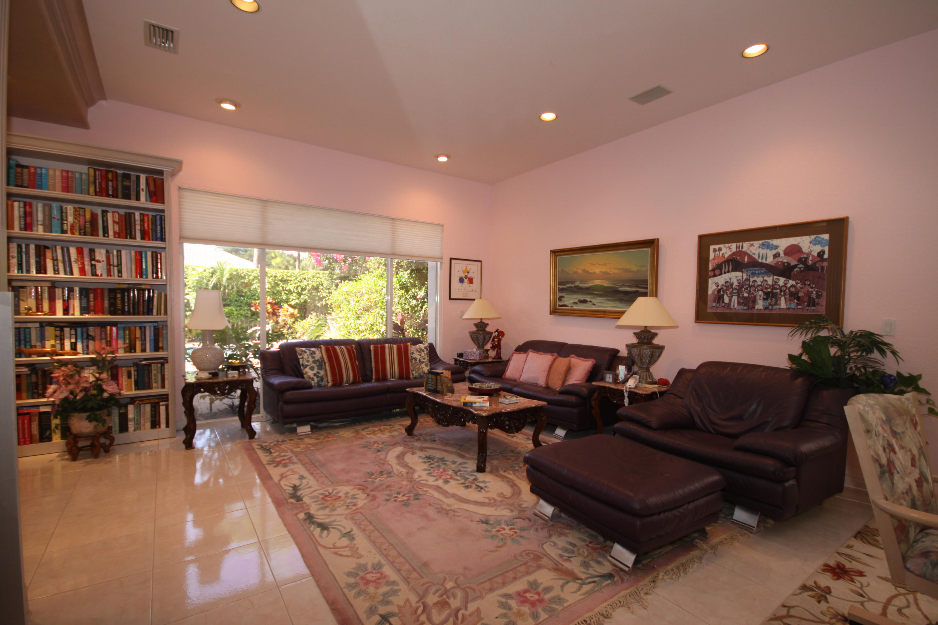 2264 Northwest 60th Street Boca Raton, FL 33496 - Photo 12 of 19 a living room with furniture and a window