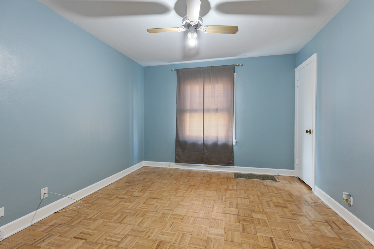 6600 North Ridge Boulevard, Unit 1 Chicago, IL 60626 - Photo 11 of 14 a view of an empty room and window