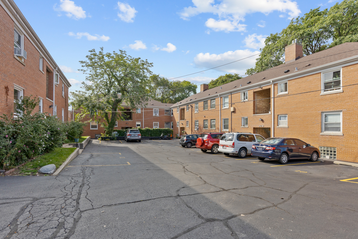 6600 North Ridge Boulevard, Unit 1 Chicago, IL 60626 - Photo 13 of 14 a view of a cars parked in front of a house