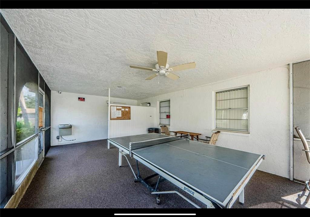 239 South McMullen Booth Road, Unit 38 Clearwater, FL 33759 - Photo 30 of 32 a room with pool table and windows