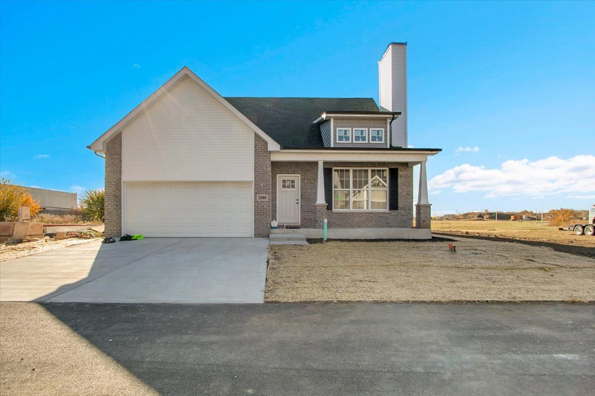 a front view of a house with a ocean view