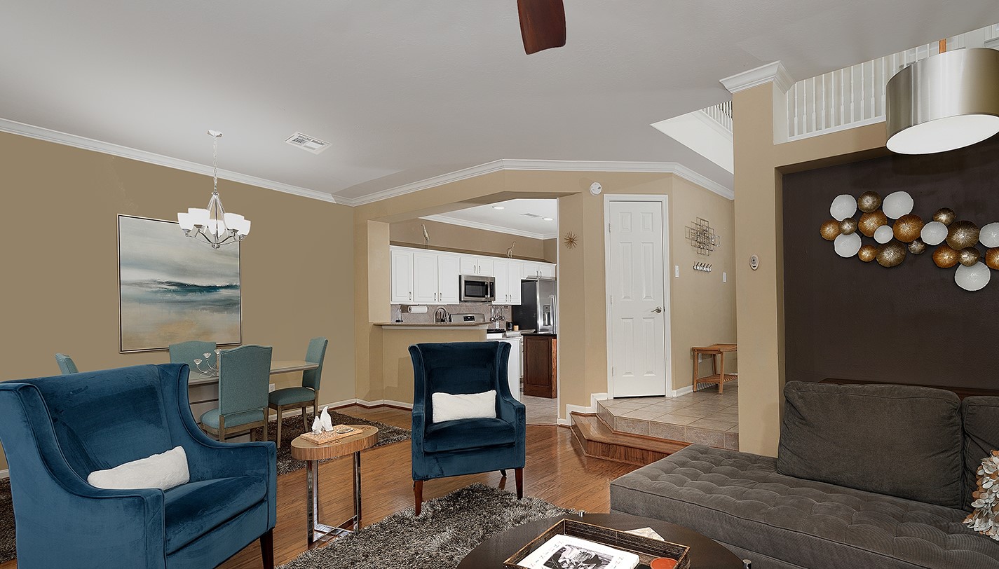 110 North Valley Oaks Circle The Woodlands, TX 77382 - Photo 6 of 29 a living room with furniture and a wooden floor