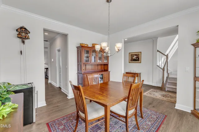 a view of a livingroom with furniture and wooden floor