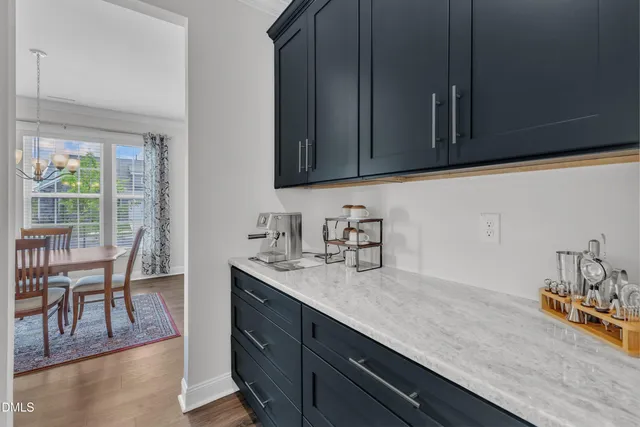 a room with furniture and a book shelf