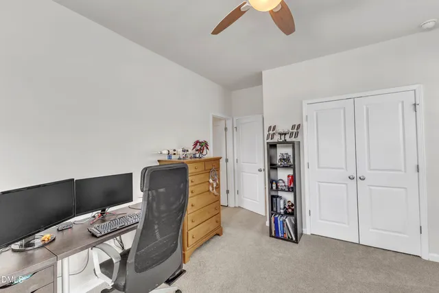 a bedroom with furniture and a window