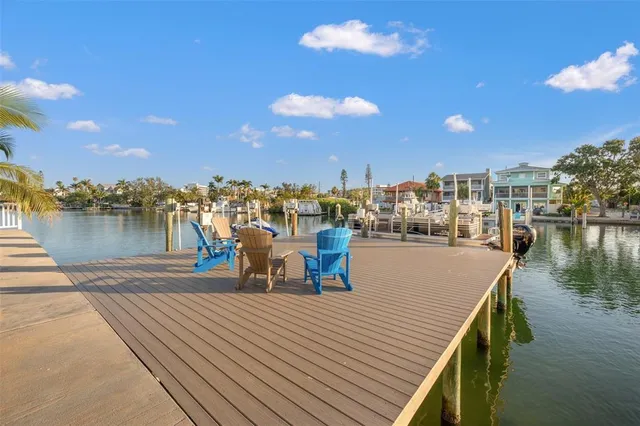 a view of a lake with a yard
