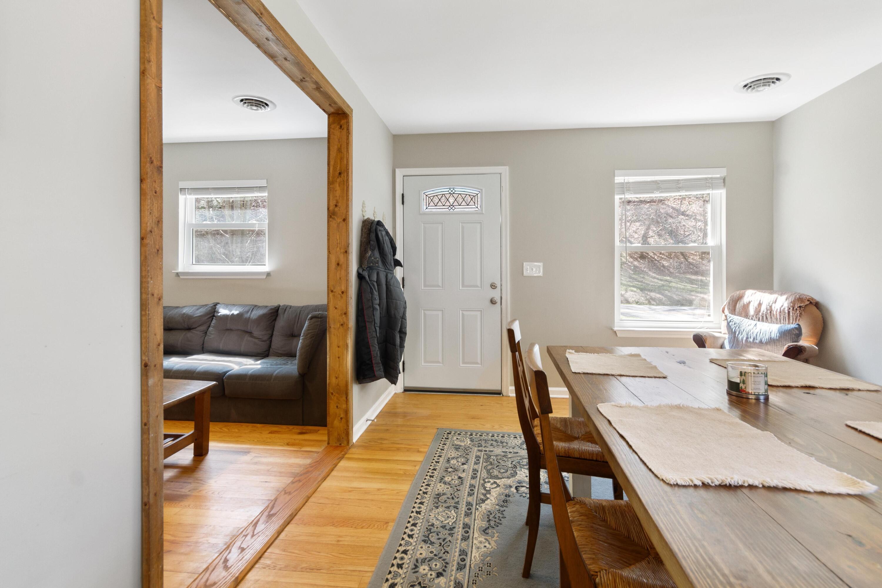 3600 Pilot Road Riner, VA 24149 - Photo 22 of 48 a view of a dining room with furniture and a rug