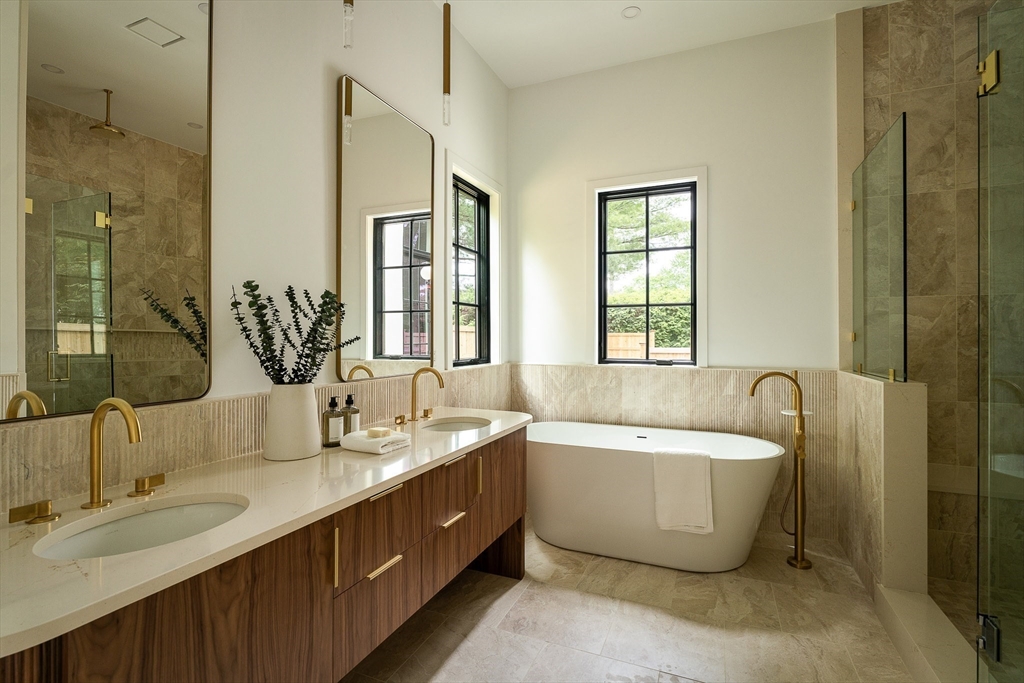 19 Bonnybrook Road Newton, MA 02468 - Photo 21 of 42 a spacious bathroom with sink double vanity shower and a bathtub