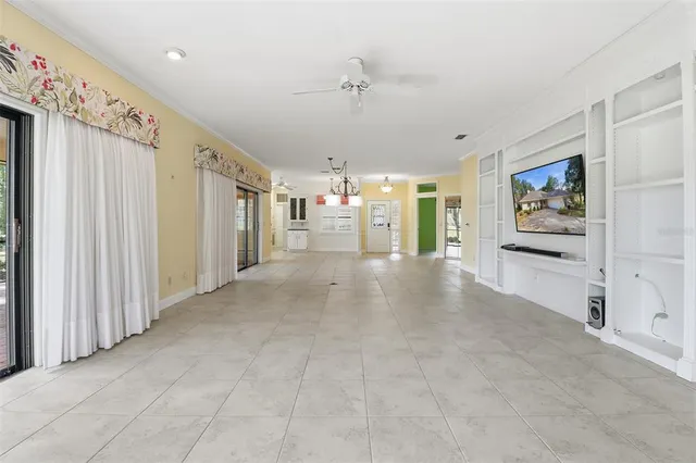 a view of livingroom with hardwood floor and a ceiling fan