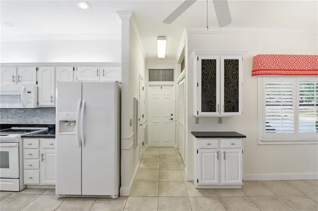 a kitchen that has a cabinets and a stove