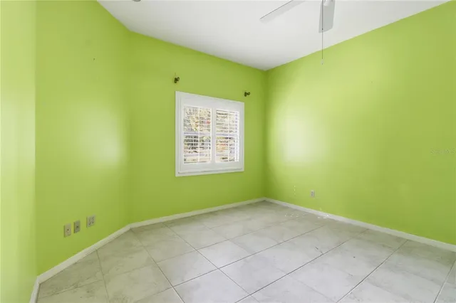 a view of a big room with windows