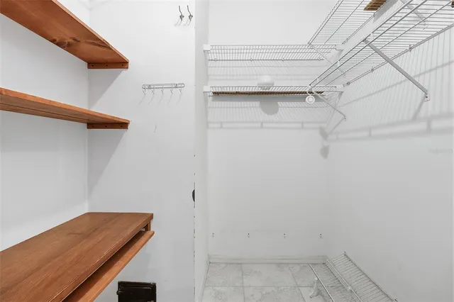 a view of small space with racks on the wall