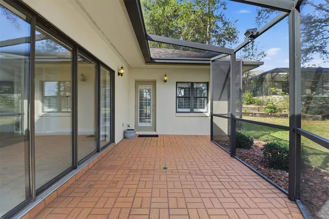 a view of porch with a floor to ceiling windows