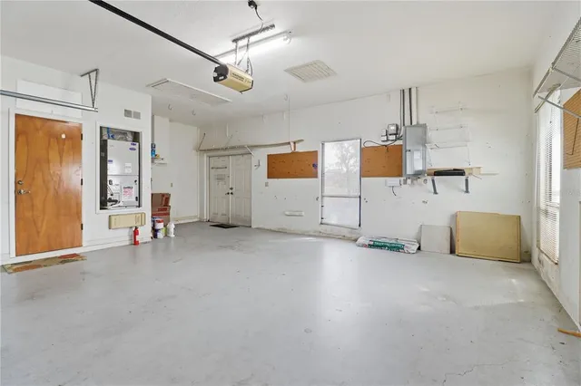 a view of a garage with stairs