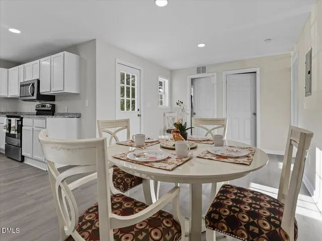 a side view of a bench in a backyard