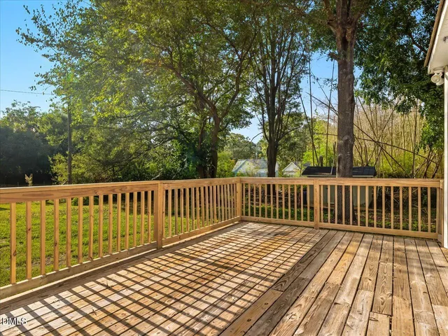 a bathroom with a sink a mirror and a toilet