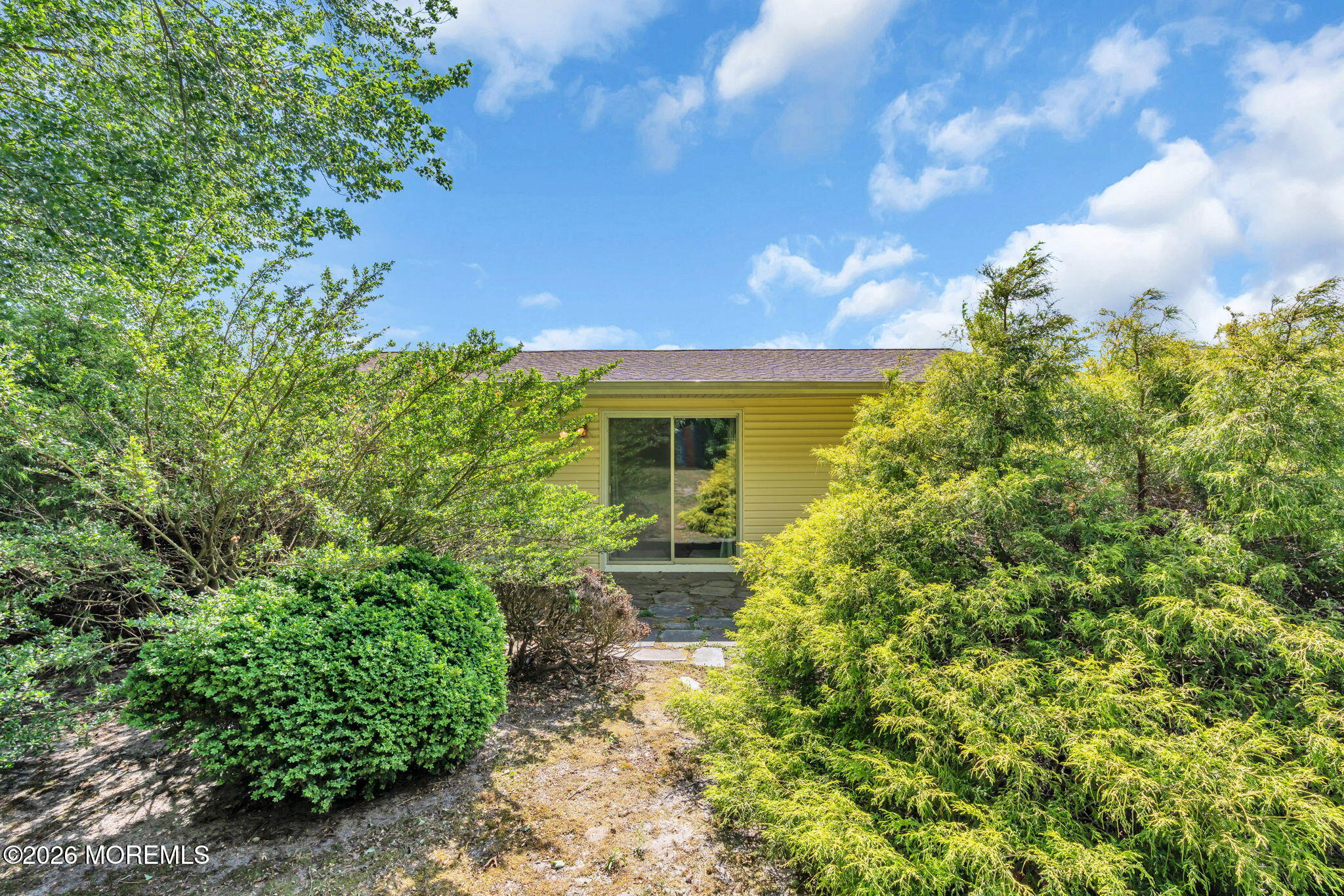 30 Phillips Road Brick, NJ 08724 - Photo 22 of 25 40-rear-exterior-house-from-yard-wooded