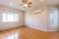 40 47th Street, Unit 2 Weehawken, NJ 07086 - Photo 6 of 8 an empty room with windows and fan