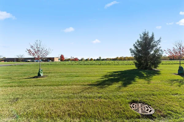 a view of a golf course with a lake