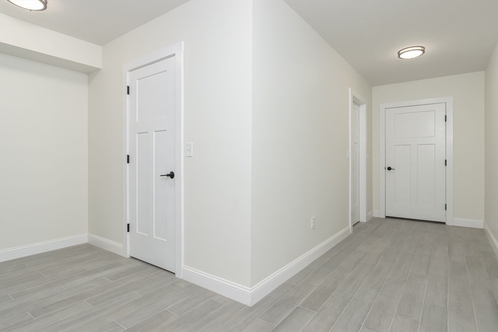 76 Robin Hill Road Groton, MA 01450 - Photo 29 of 42 a view of an empty room