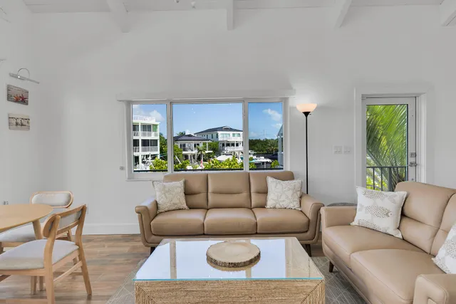 a kitchen with a stove a sink and a refrigerator