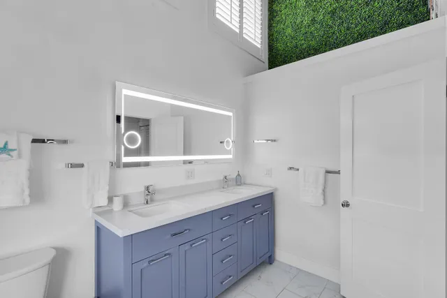 a view of livingroom with table and chairs