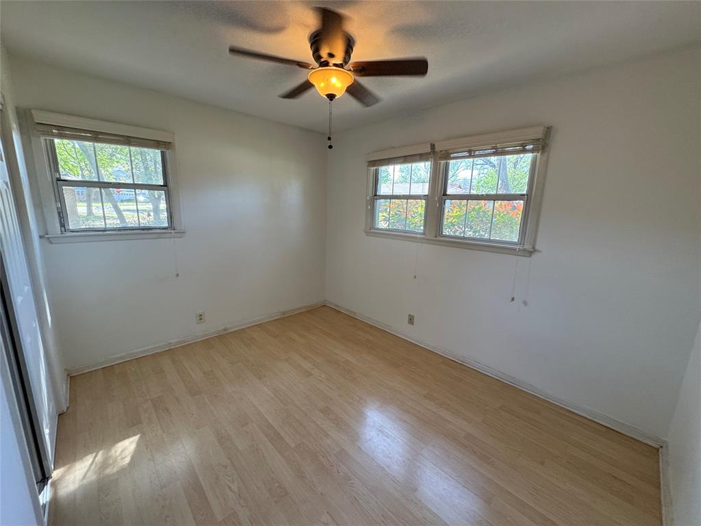 1148 Simpson Drive Hurst, TX 76053 - Photo 15 of 17 a view of an empty room with a window