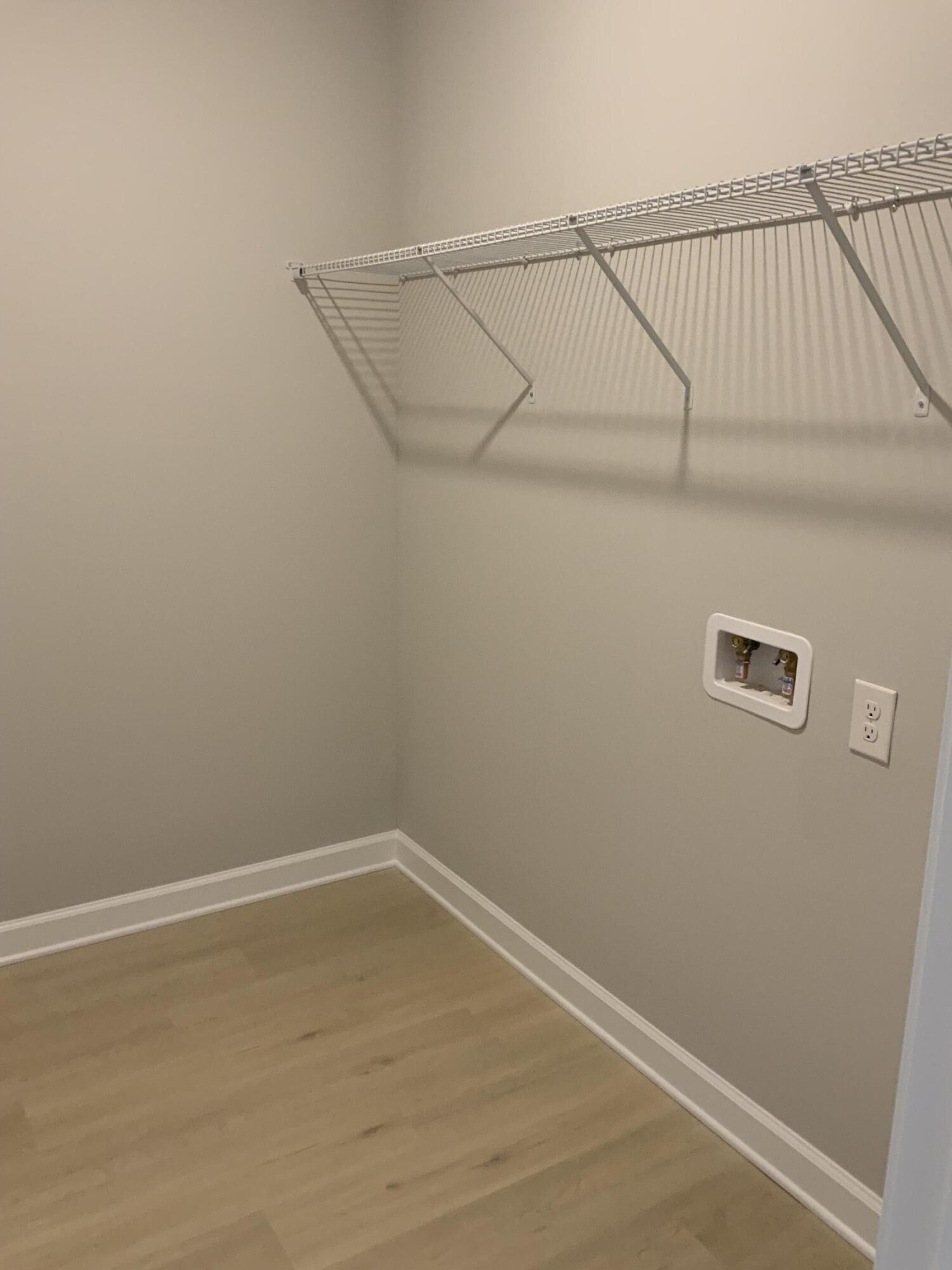 5239 Griffith Mill Road Baker, FL 32531 - Photo 9 of 9 a view of small space with racks on the wall