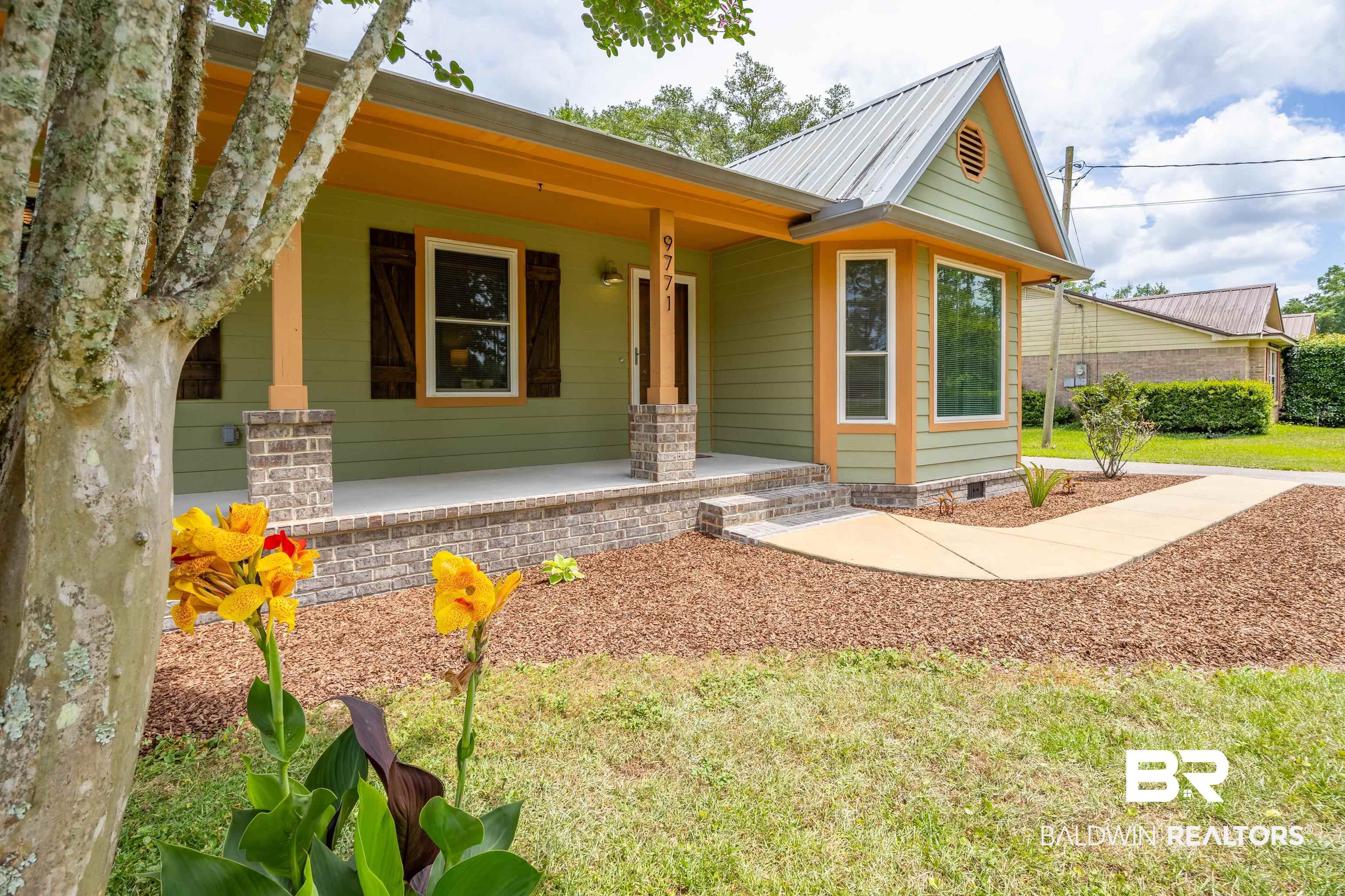 9771 Clarke Ridge Road Foley, AL 36535 - Photo 61 of 72 View of front of house with covered porch.