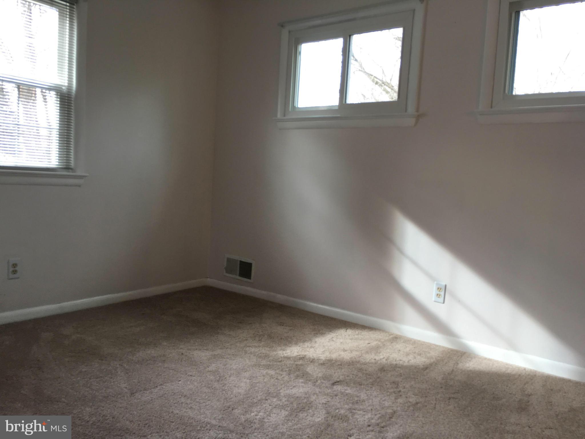 4307 Havard Street Silver Spring, MD 20906 - Photo 16 of 27 an empty room with windows