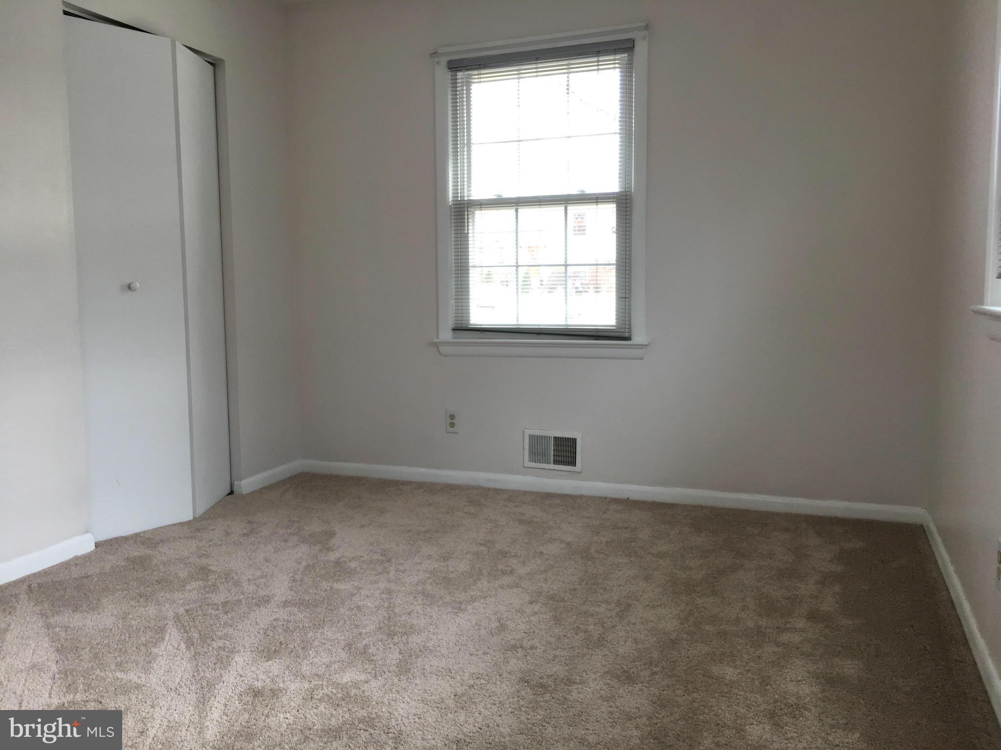 4307 Havard Street Silver Spring, MD 20906 - Photo 17 of 27 an empty room with a window