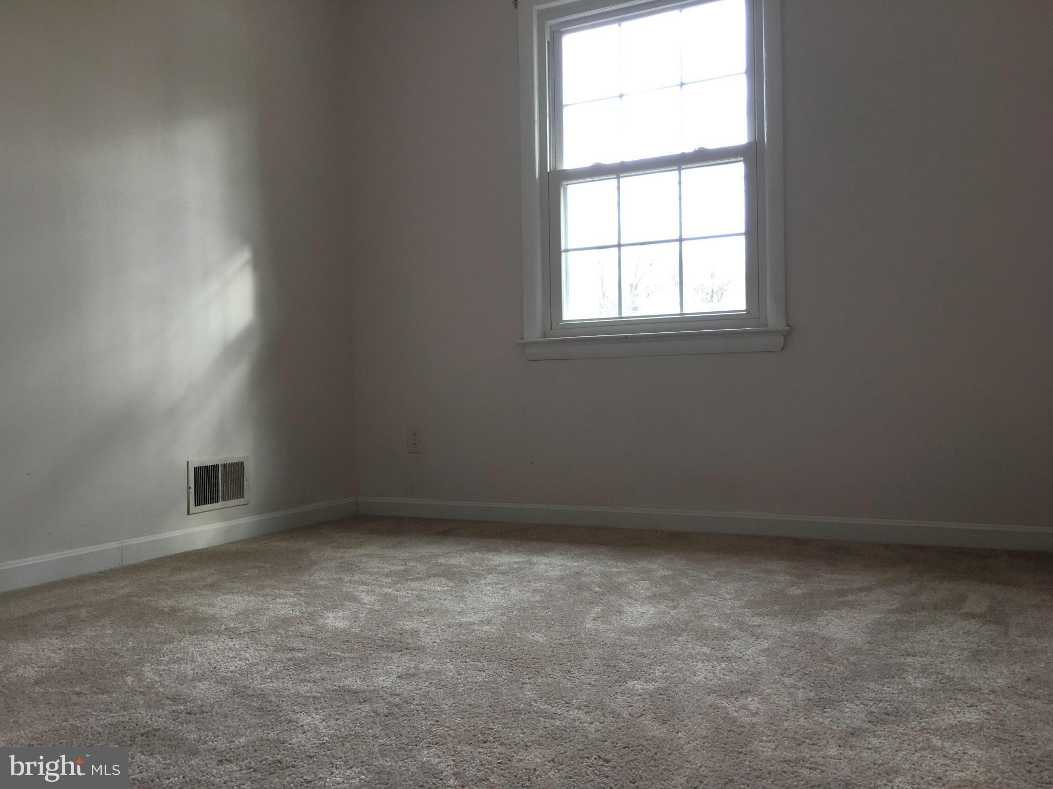 4307 Havard Street Silver Spring, MD 20906 - Photo 18 of 27 an empty room with a window