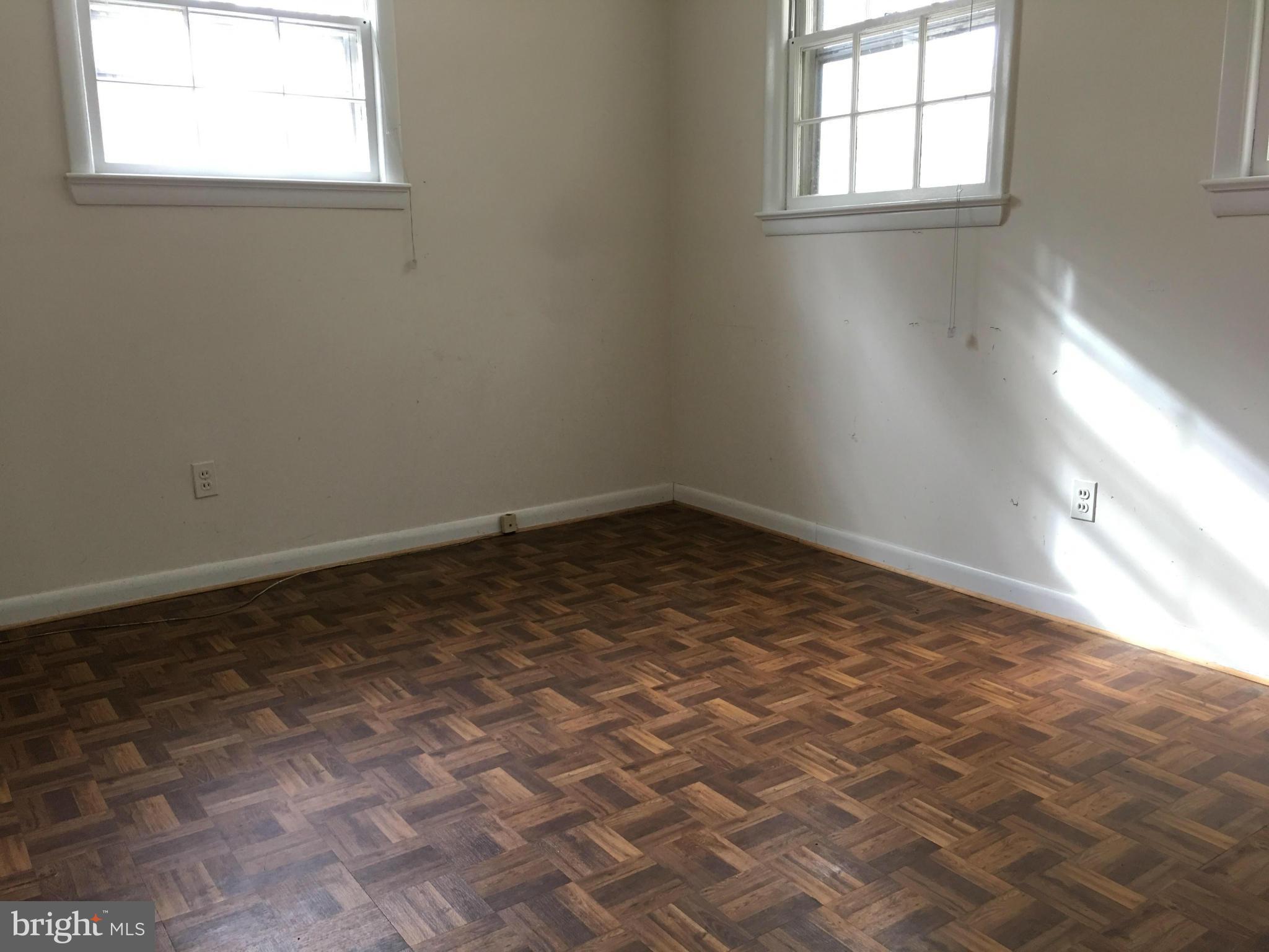 4307 Havard Street Silver Spring, MD 20906 - Photo 22 of 27 an empty room with a window