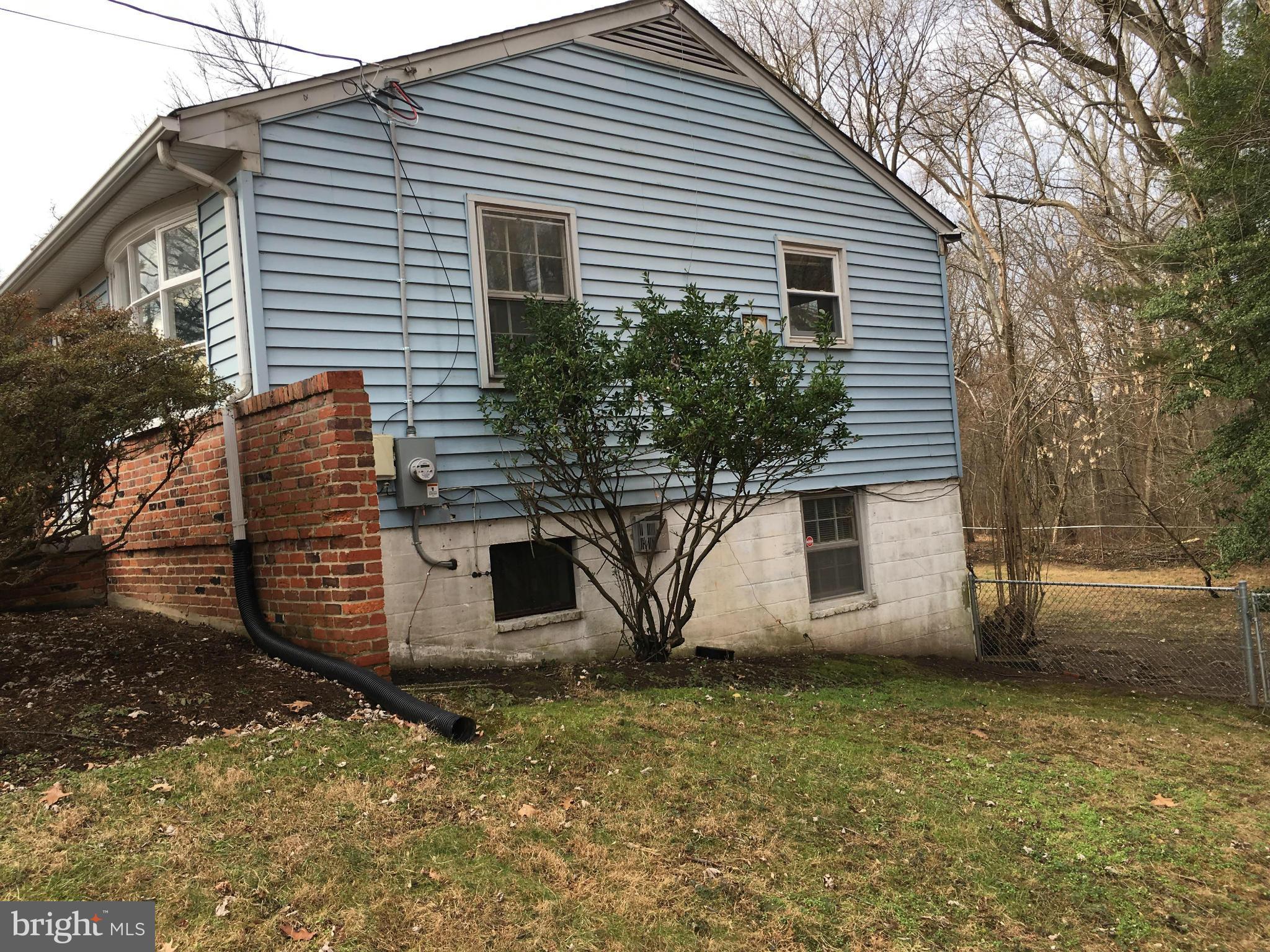 4307 Havard Street Silver Spring, MD 20906 - Photo 25 of 27 a view of a house with a yard