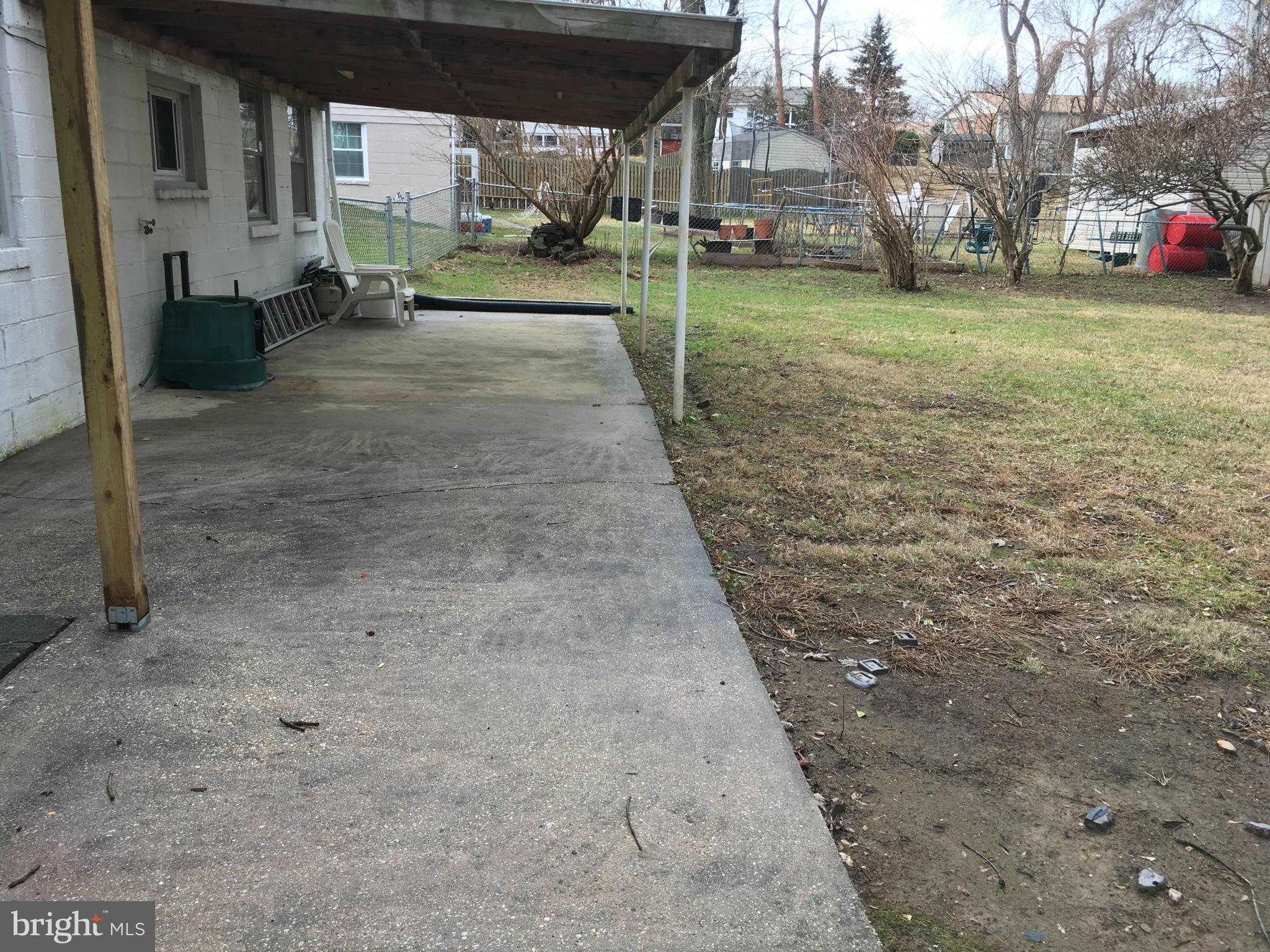 4307 Havard Street Silver Spring, MD 20906 - Photo 26 of 27 a view of a yard with car parked