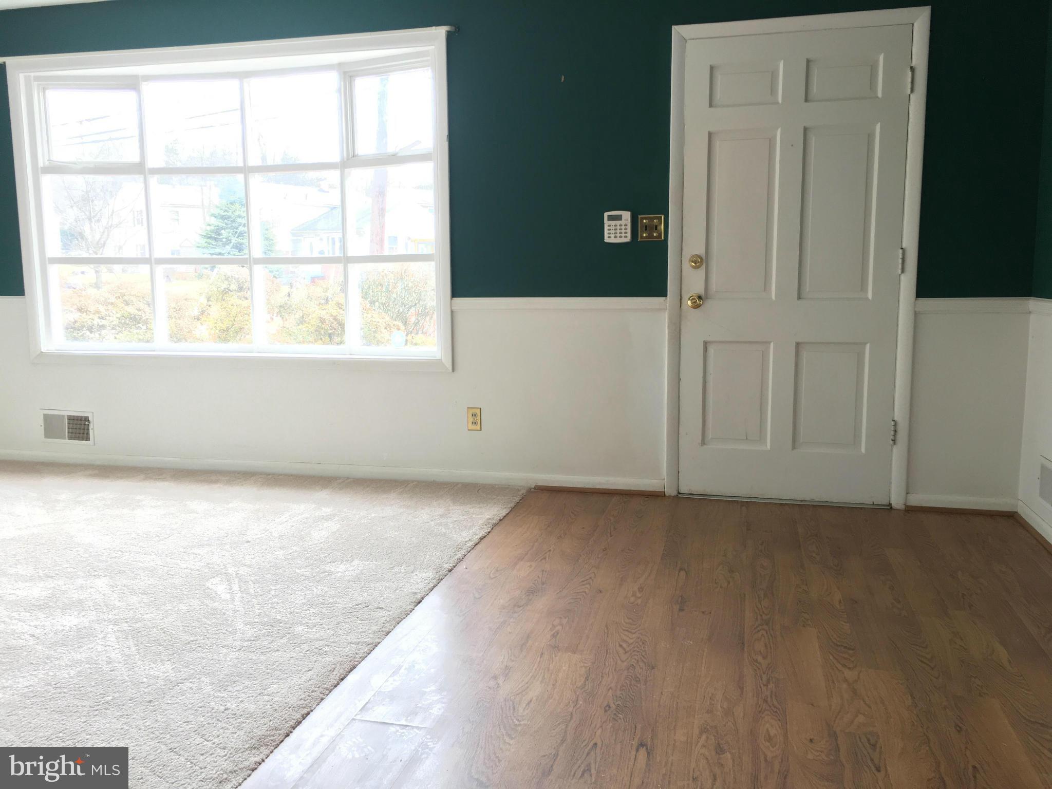 4307 Havard Street Silver Spring, MD 20906 - Photo 6 of 27 an empty room with windows