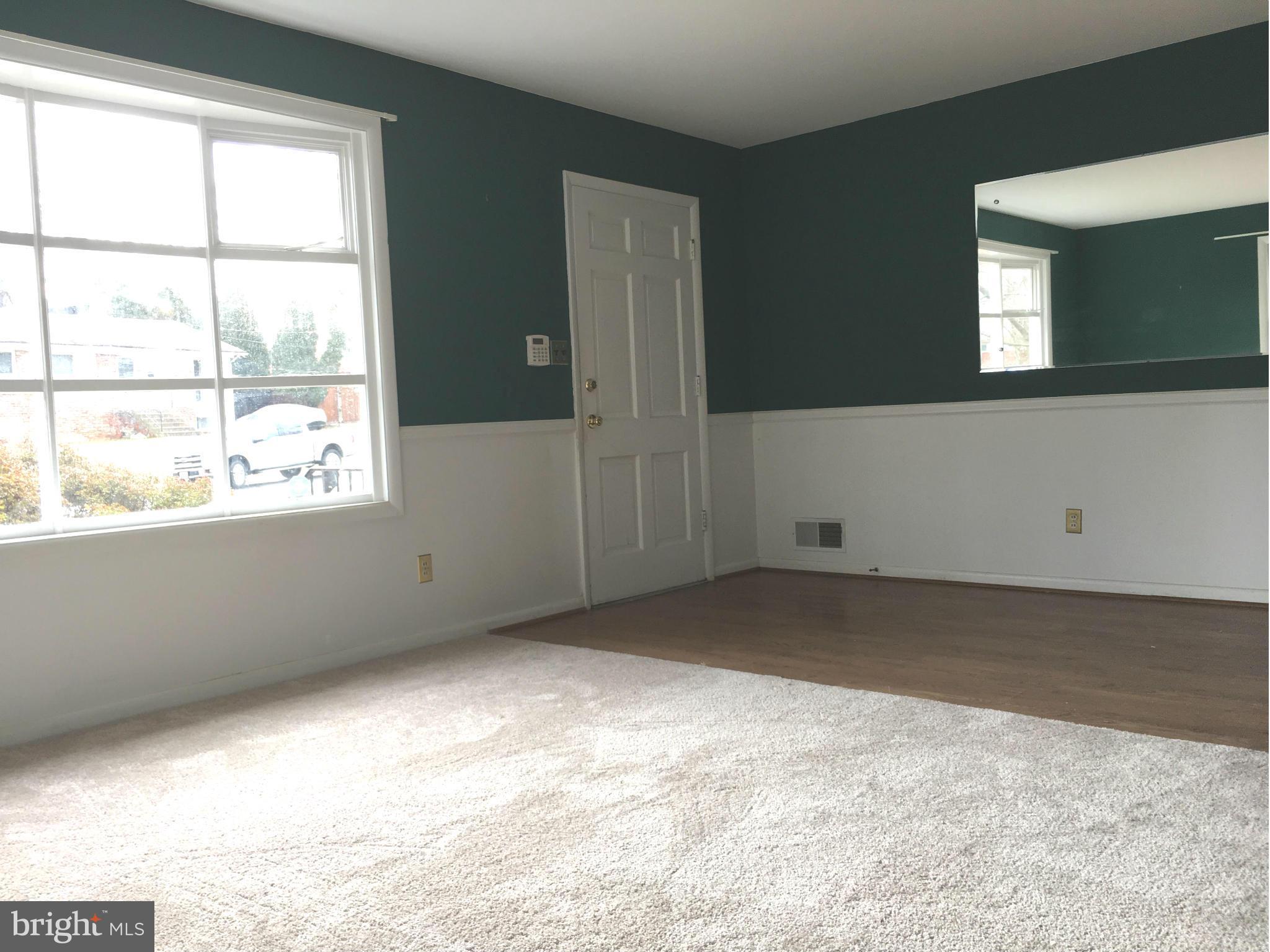 4307 Havard Street Silver Spring, MD 20906 - Photo 7 of 27 an empty room with a window