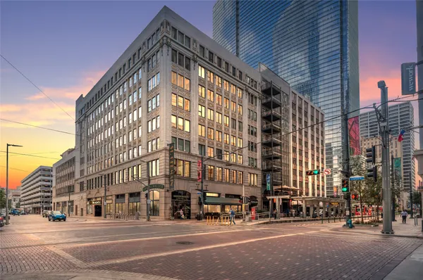 a view of a building and a street