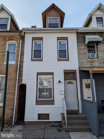 a front view of a house with a door