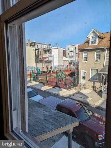 a view of a dinning room with furniture