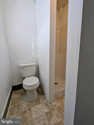 a bathroom with a toilet
