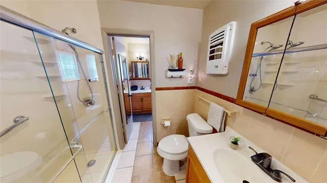 a bathroom with a sink and toilet