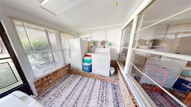 a storage room with wooden floor and furniture