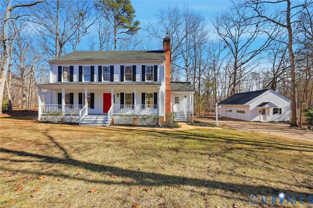 3264 Sherwood Ridge Way Powhatan, VA 23139 - Photo 3 of 40 a front view of a house with a ocean view