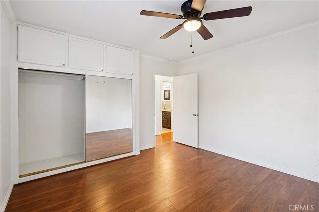 732 East Charron Place Compton, CA 90220 - Photo 18 of 24 a view of an empty room with wooden floor